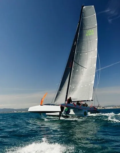  Yacht Photos Pics Sailing on a Westerly GF 42 Custom catamaran, 2012 model, in clear blue waters.