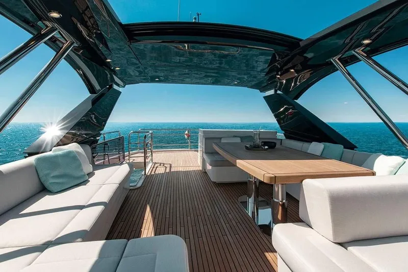 Illuzion Yacht Photos Pics Luxurious 2020 Monte Carlo Yachts MCY 70 with elegant deck and ocean view.