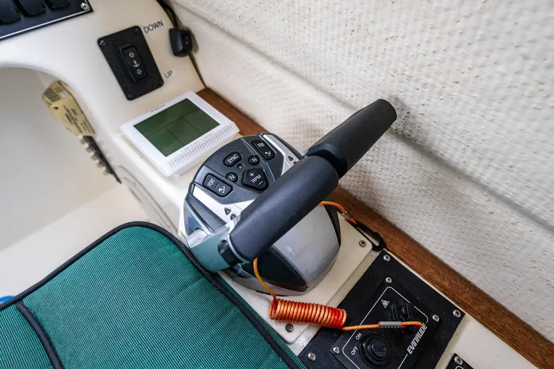 Pretty Penny Yacht Photos Pics Control panel of a 2006 C-Dory 25' Tomcat Catamaran with throttle and switches.