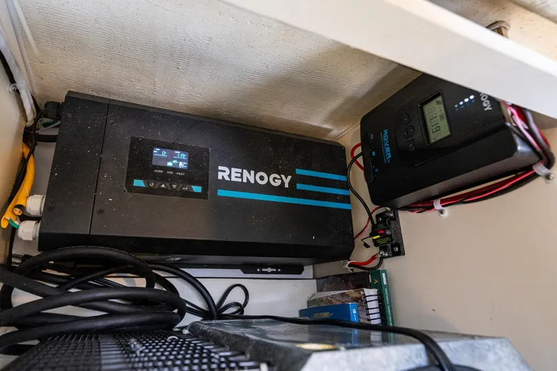 Pretty Penny Yacht Photos Pics Renogy power system in 2006 C-Dory 25' Tomcat Catamaran, featuring cables and control panel.