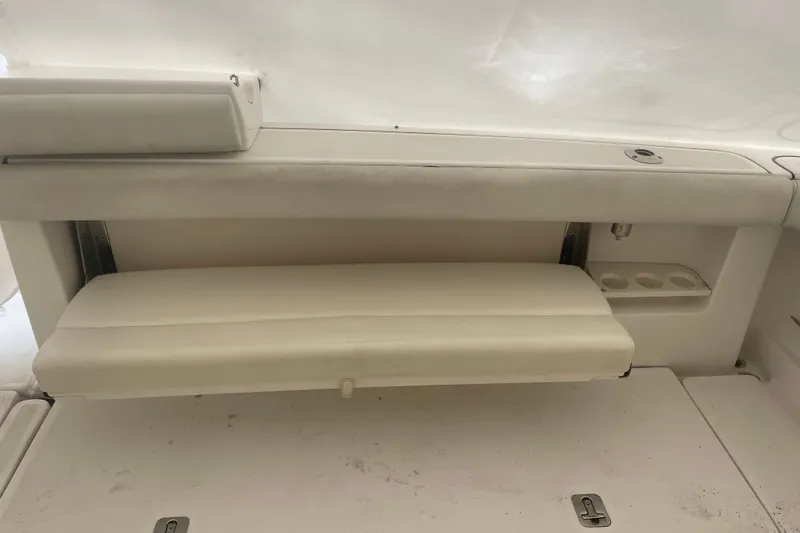 Son Days Yacht Photos Pics 2006 Tiara Yachts 3800 Open interior seating with cup holders and storage.