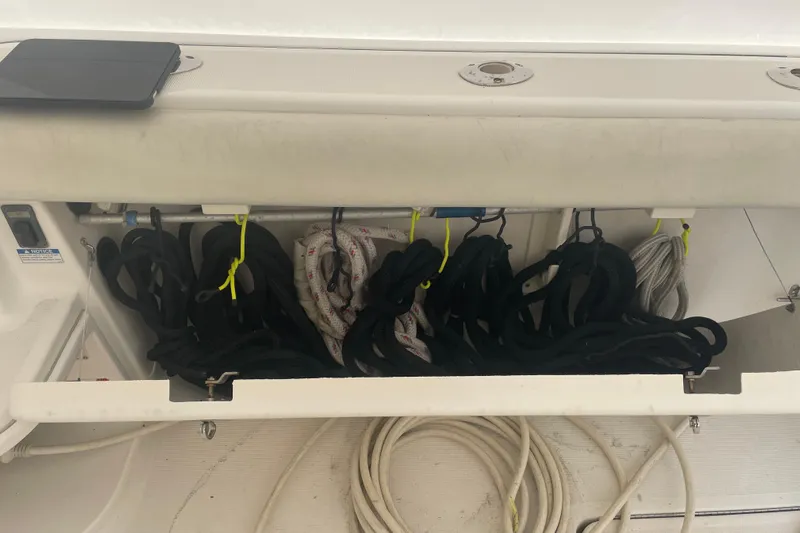 Son Days Yacht Photos Pics Storage compartment with ropes on a 2006 Tiara Yachts 3800 Open.