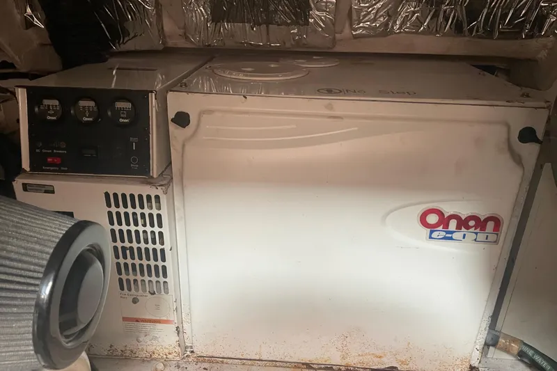 Son Days Yacht Photos Pics Onan generator in 2006 Tiara Yachts 3800 Open engine room.