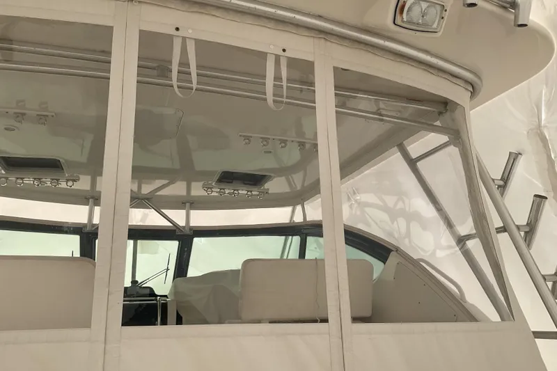 Son Days Yacht Photos Pics 2006 Tiara Yachts 3800 Open cockpit with protective enclosure and seating.