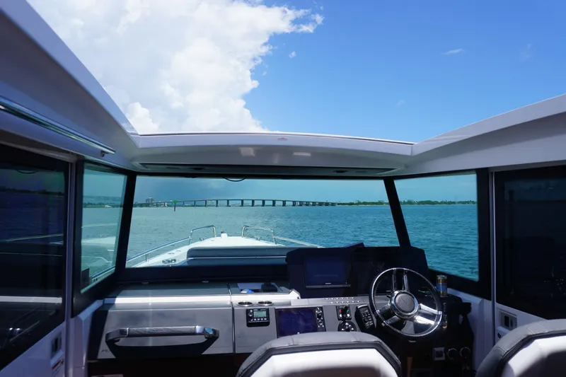 Wanderlust Yacht Photos Pics Interior view of 2020 Axopar 37 XC Cross Cabin boat on open water.