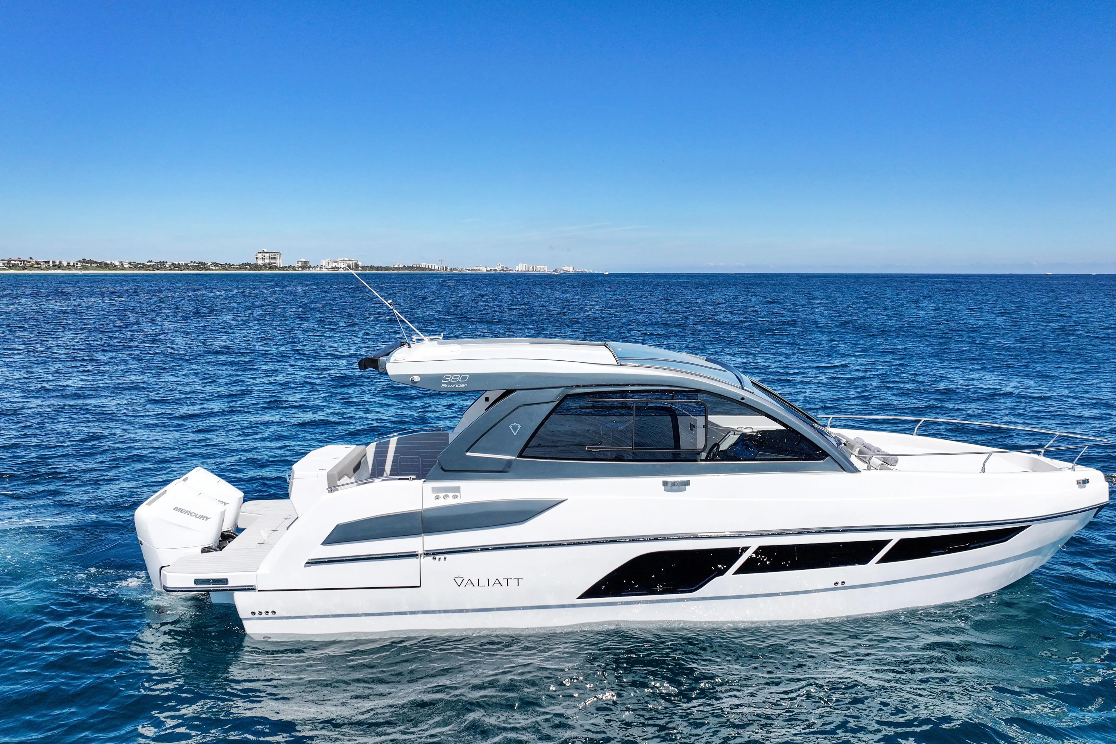 2025 Valiatt 380 Bowrider cruising on open blue sea under clear sky.