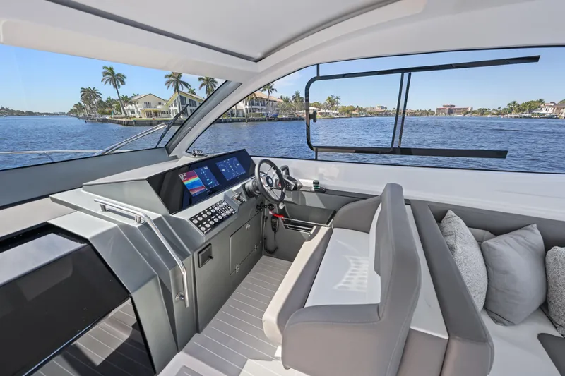  Yacht Photos Pics 2025 VALIATT YACHTS 380 Bowrider interior with modern helm and waterfront view.