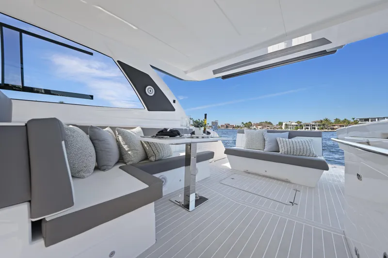  Yacht Photos Pics Luxurious 2025 VALIATT YACHTS 380 Bowrider interior with elegant seating and scenic water view.