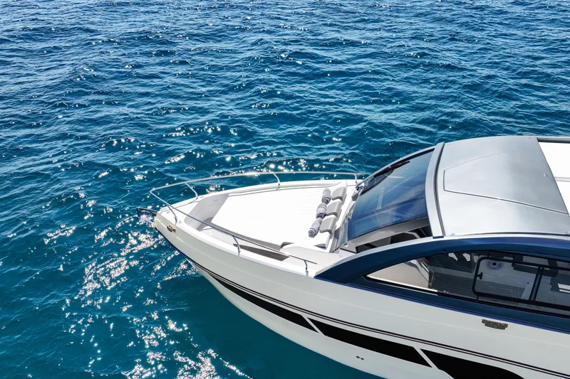  Yacht Photos Pics 2025 VALIATT YACHTS 380 Bowrider cruising on sparkling blue ocean waters.