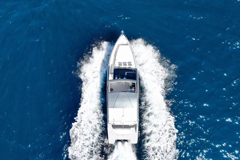  Yacht Photos Pics Aerial view of 2025 VALIATT YACHTS 380 Bowrider cruising on blue ocean waters.