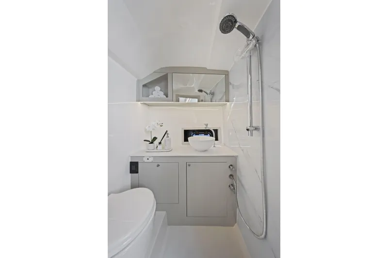  Yacht Photos Pics Modern bathroom in 2025 VALIATT YACHTS 380 Bowrider, featuring sleek design and fixtures.