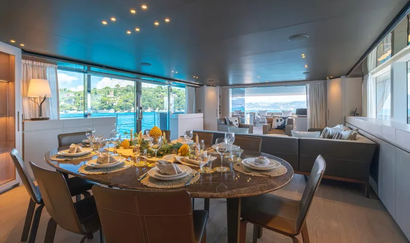  Yacht Photos Pics Luxurious interior of 2024 Sanlorenzo SD118 yacht with elegant dining area and scenic views.
