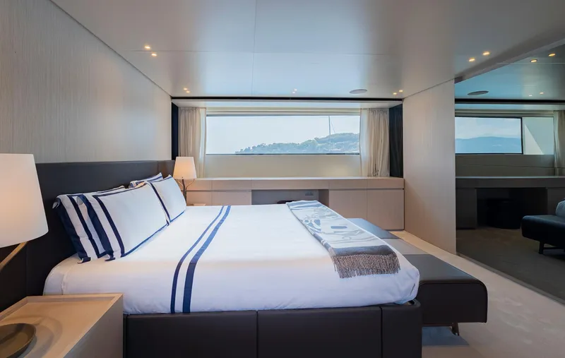  Yacht Photos Pics Luxurious bedroom interior of 2024 Sanlorenzo SD118 yacht with modern design and large window view.