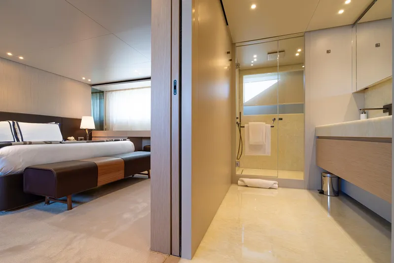  Yacht Photos Pics Luxurious Sanlorenzo SD118 2024 yacht interior with modern bedroom and ensuite bathroom.
