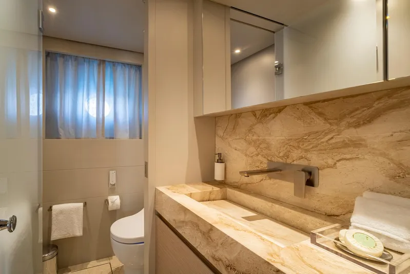  Yacht Photos Pics Luxurious bathroom in 2024 Sanlorenzo SD118 yacht with elegant marble finishes and modern fixtures.