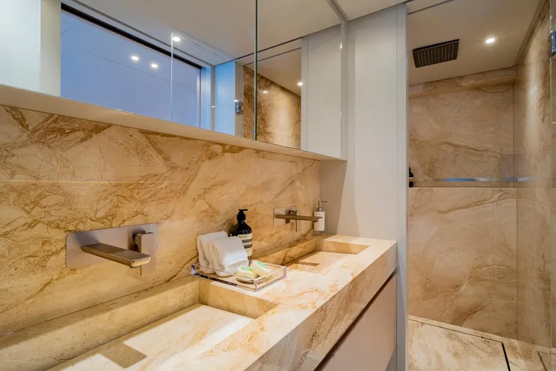  Yacht Photos Pics Luxurious bathroom in 2024 Sanlorenzo SD118 yacht with elegant marble finishes.