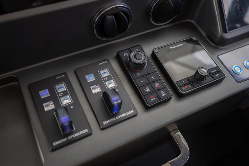 Seahawk Yacht Photos Pics Control panel of 2025 Azimut Magellano 66 yacht with engine operation switches.