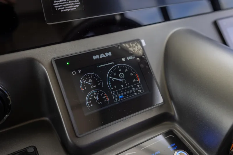 Seahawk Yacht Photos Pics Dashboard of 2025 Azimut Magellano 66 yacht with digital display and gauges.