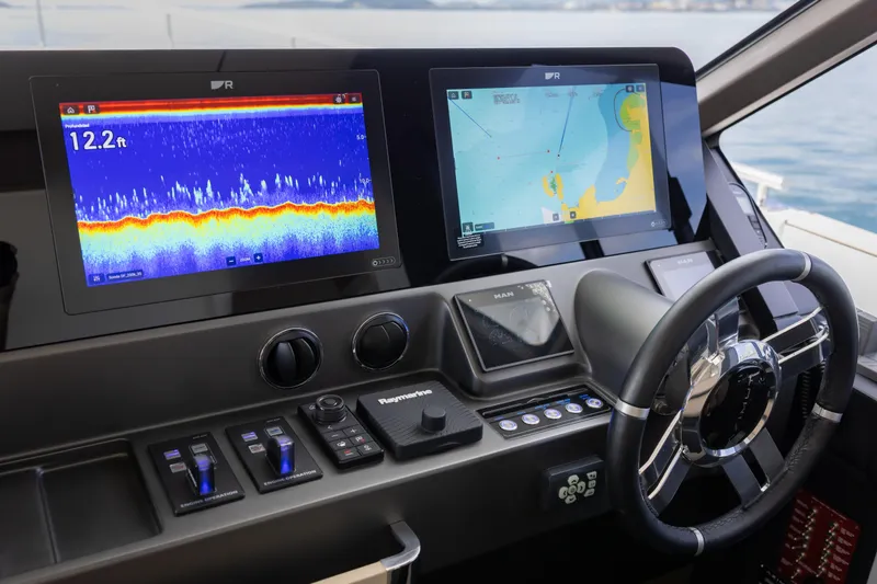 Seahawk Yacht Photos Pics Cockpit of 2025 Azimut Magellano 66 yacht with advanced navigation displays.