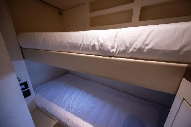 Seahawk Yacht Photos Pics Bunk beds in the 2025 Azimut Magellano 66 yacht cabin, featuring modern design and comfort.