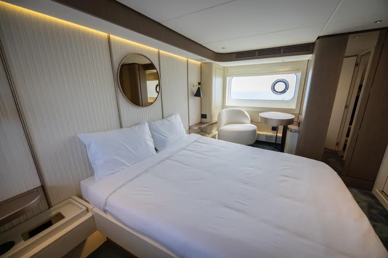 Seahawk Yacht Photos Pics Luxurious bedroom interior of 2025 Azimut Magellano 66 yacht with modern design.