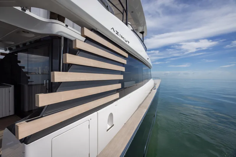 Seahawk Yacht Photos Pics Azimut Magellano 66 yacht, 2025 model, cruising on calm ocean waters.