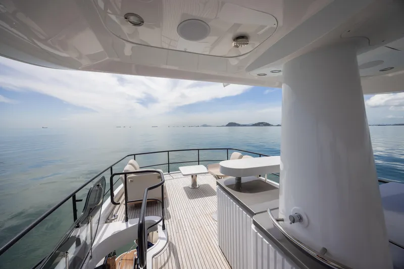 Seahawk Yacht Photos Pics Luxurious deck of 2025 Azimut Magellano 66 yacht with ocean view.