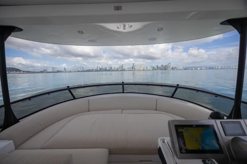 Seahawk Yacht Photos Pics 2025 Azimut Magellano 66 yacht interior with city skyline view.