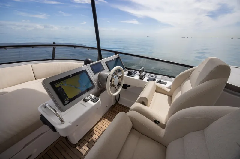 Seahawk Yacht Photos Pics Luxurious helm of 2025 Azimut Magellano 66 yacht with modern navigation systems.