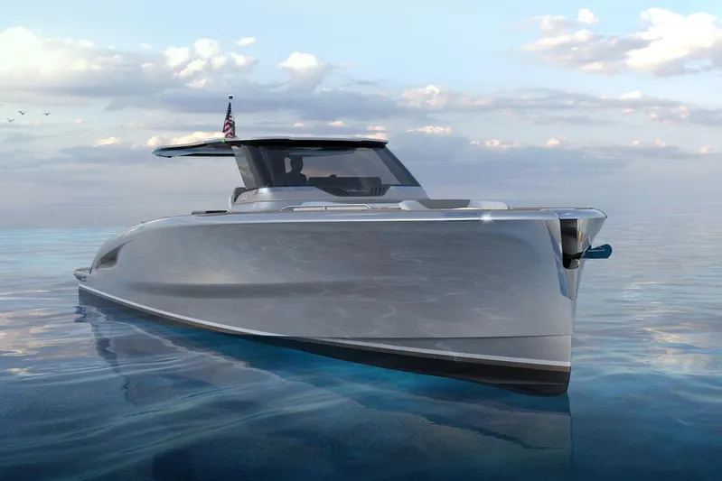  Yacht Photos Pics Futuristic 2026 Solaris Power 44ST yacht on calm ocean waters under a cloudy sky.