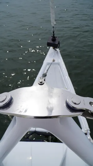 Sovereign Yacht Photos Pics Bow of 2006 Lidgard Custom Catamaran on water, showcasing sleek design and metal fittings.