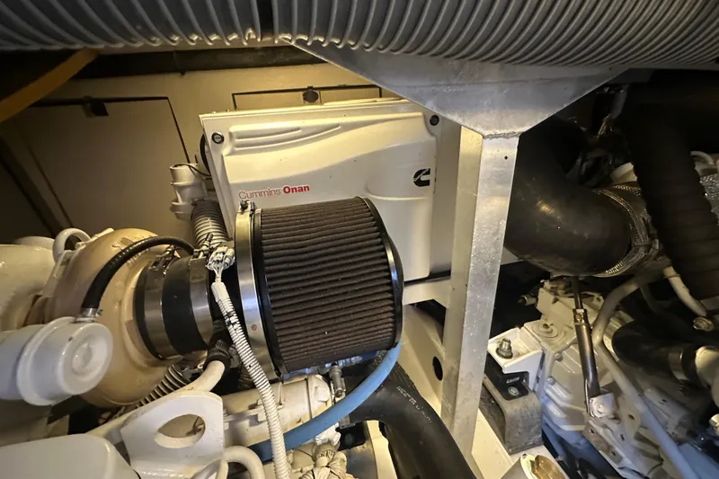 Couples Therapy Yacht Photos Pics Engine room of 2014 Jeanneau Velasco 43 with Cummins Onan generator.