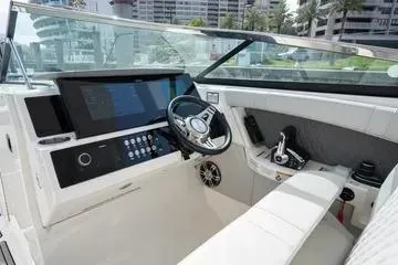  Yacht Photos Pics 2023 Sea Ray SLX 350 Outboard cockpit with modern controls and sleek design.