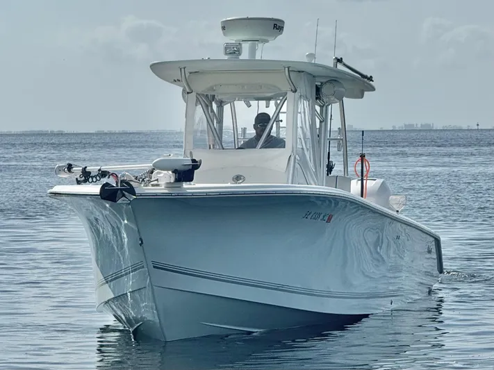  Yacht Photos Pics 2007 Palmetto 33 Custom boat cruising on calm waters.