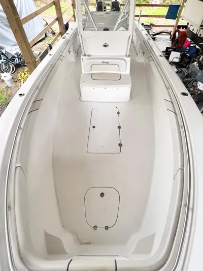  Yacht Photos Pics 2007 Palmetto 33 Custom boat interior, featuring spacious deck and seating area.