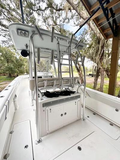  Yacht Photos Pics 2007 Palmetto 33 Custom boat interior with seating and storage under a canopy.