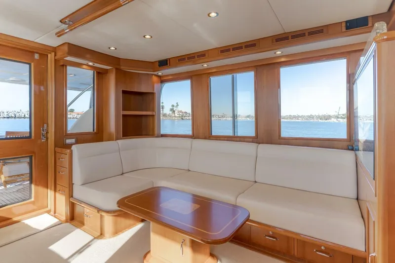 Tintagel Yacht Photos Pics Luxurious interior of 2008 Grand Banks 59 Aleutian RP yacht with panoramic windows.