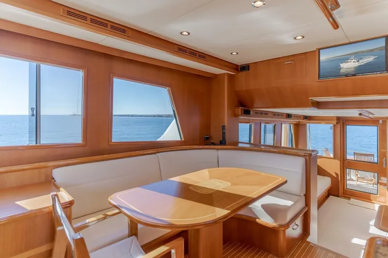 Tintagel Yacht Photos Pics Luxurious interior of 2008 Grand Banks 59 Aleutian RP yacht with ocean view.