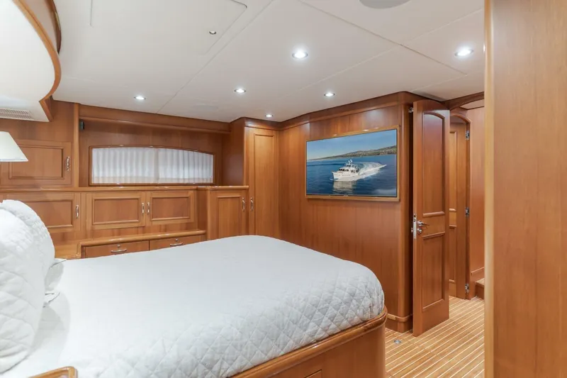 Tintagel Yacht Photos Pics Luxurious cabin interior of 2008 Grand Banks 59 Aleutian RP yacht with wood paneling.
