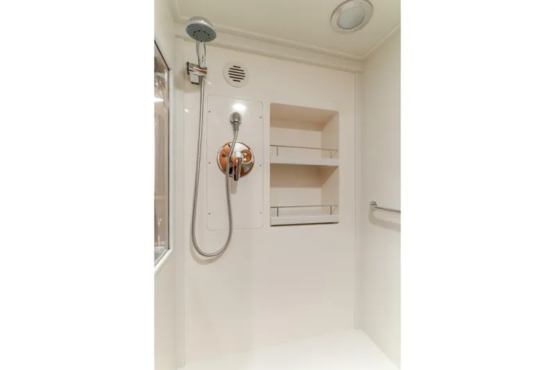 Tintagel Yacht Photos Pics Shower area in 2008 Grand Banks 59 Aleutian RP yacht with handheld showerhead.