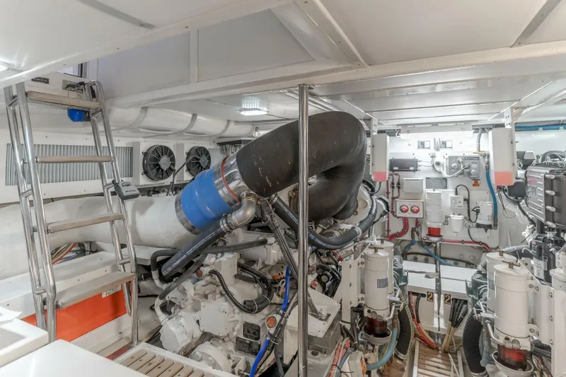 Tintagel Yacht Photos Pics Engine room of 2008 Grand Banks 59 Aleutian RP yacht, featuring complex machinery and equipment.