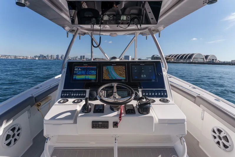 Steam N Demon Yacht Photos Pics Cockpit view of 2019 Buddy Davis 42 CC boat with advanced navigation systems.