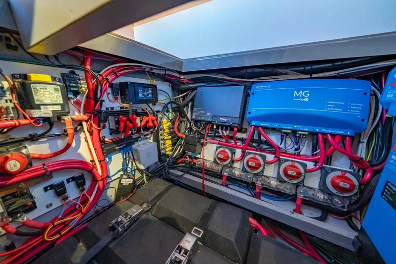 Nostos Yacht Photos Pics Electrical system of a 2020 Nautitech 40 Open catamaran, featuring wiring and control panels.