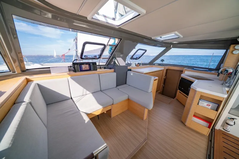 Nostos Yacht Photos Pics Interior of 2020 Nautitech 40 Open catamaran with modern seating and ocean view.