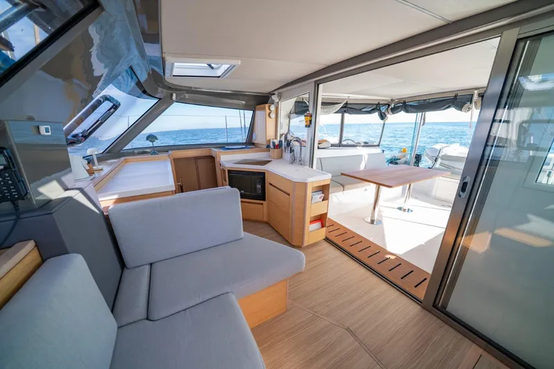 Nostos Yacht Photos Pics Interior of 2020 Nautitech 40 Open catamaran with modern design and ocean view.