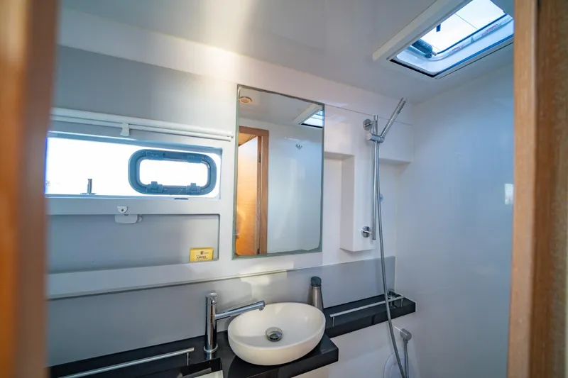 Nostos Yacht Photos Pics Modern bathroom in 2020 Nautitech 40 Open yacht with sleek fixtures and natural light.
