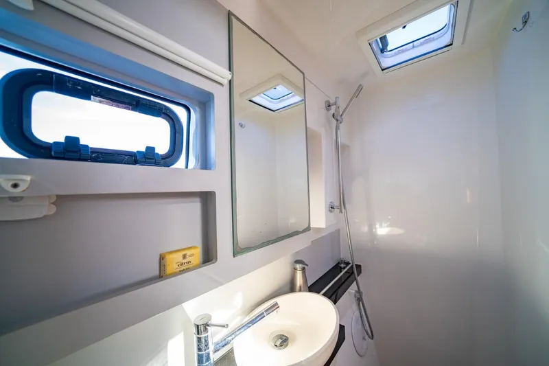 Nostos Yacht Photos Pics Modern bathroom in 2020 Nautitech 40 Open yacht with skylight and sleek fixtures.