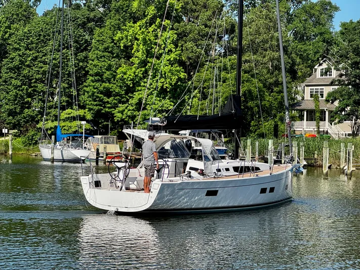  Yacht Photos Pics 2024 J Boats J/40 sailboat docked in a serene marina setting.