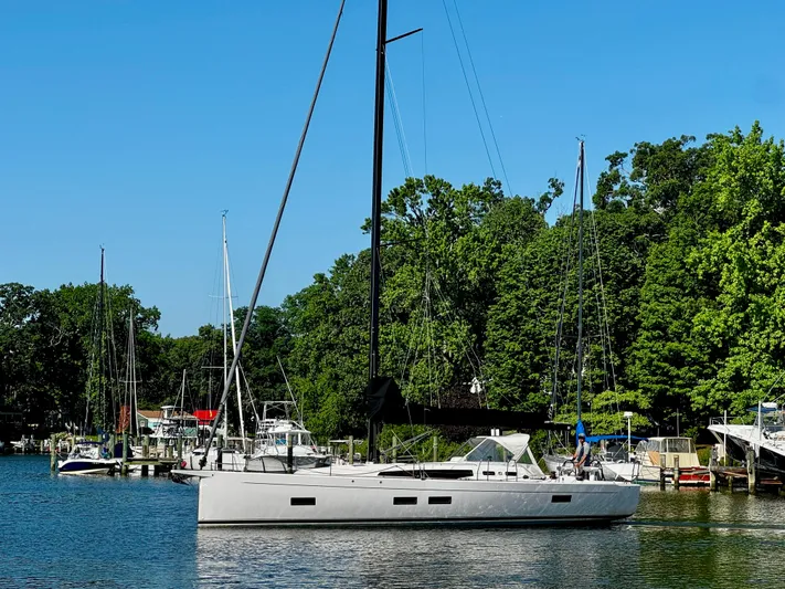  Yacht Photos Pics 2024 J Boats J/40 sailboat docked in a serene marina setting.