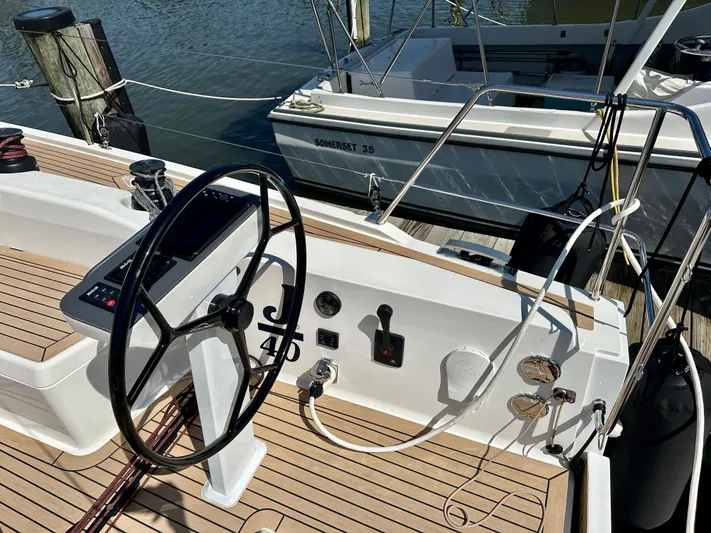  Yacht Photos Pics 2024 J Boats J/40 sailboat cockpit with steering wheel and control panel.